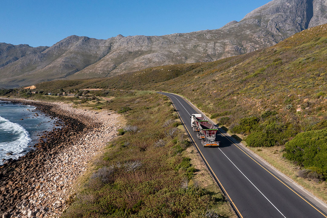 Truck driving along a scenic coastal road