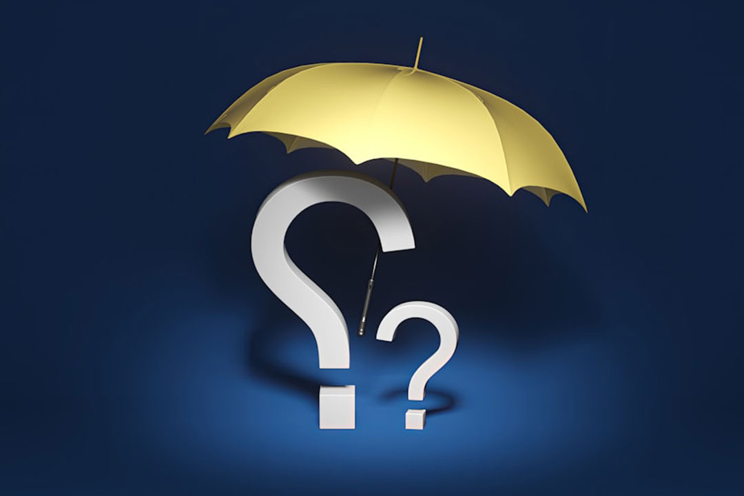 a yellow umbrella with a question mark underneath it